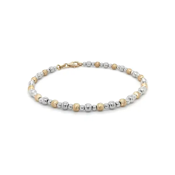 Женский браслет из комбинированного золота