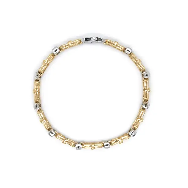 Золотой женский браслет из комбинированного золота