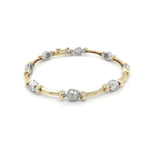 Женский браслет из комбинированного золота