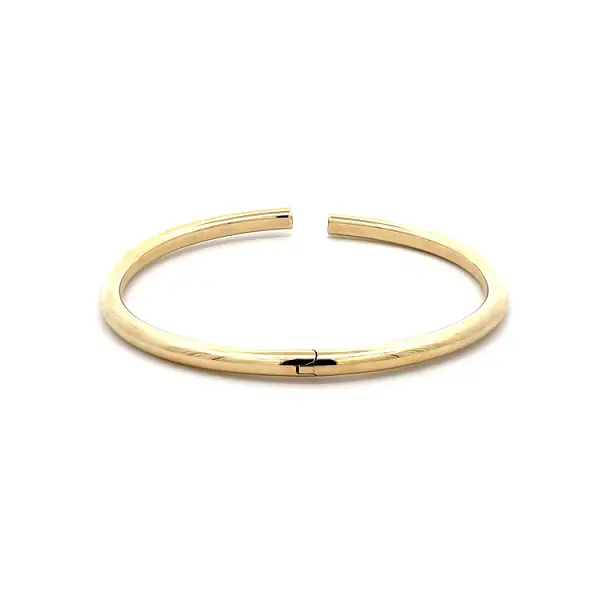 Современный золотой браслет с акцентом на легкость и элегантность