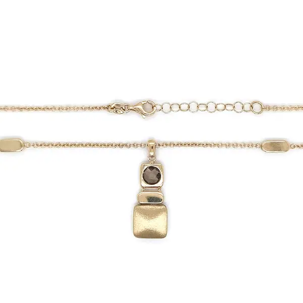 Золотое ожерелье с коричневым камнем