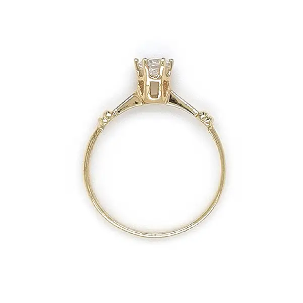 Золотое обручальное кольцо с цирконом