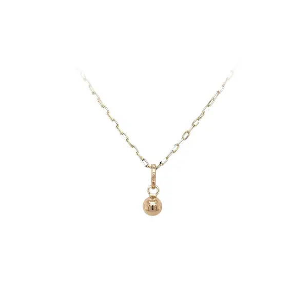 Золотой кулон с изображением пули