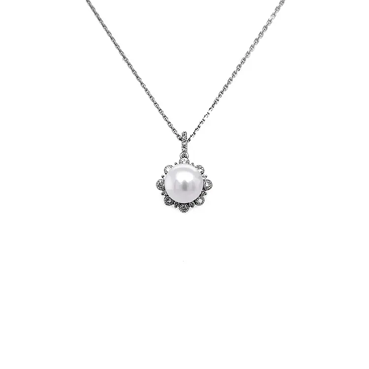 Золотая подвеска с натуральным жемчугом и бриллиантами