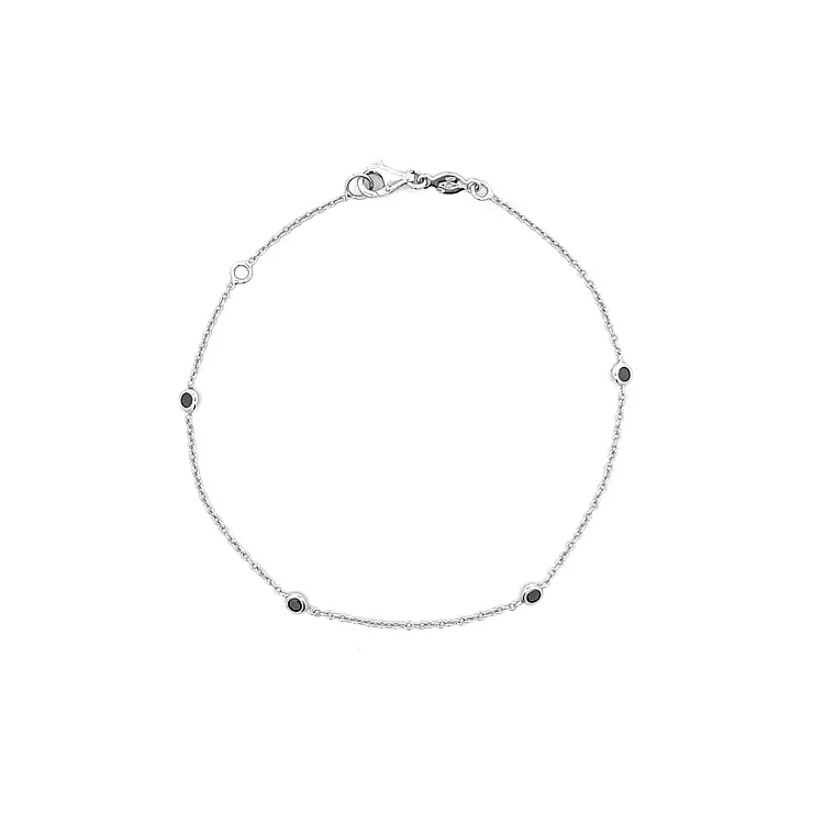 Золотой браслет с черными камнями