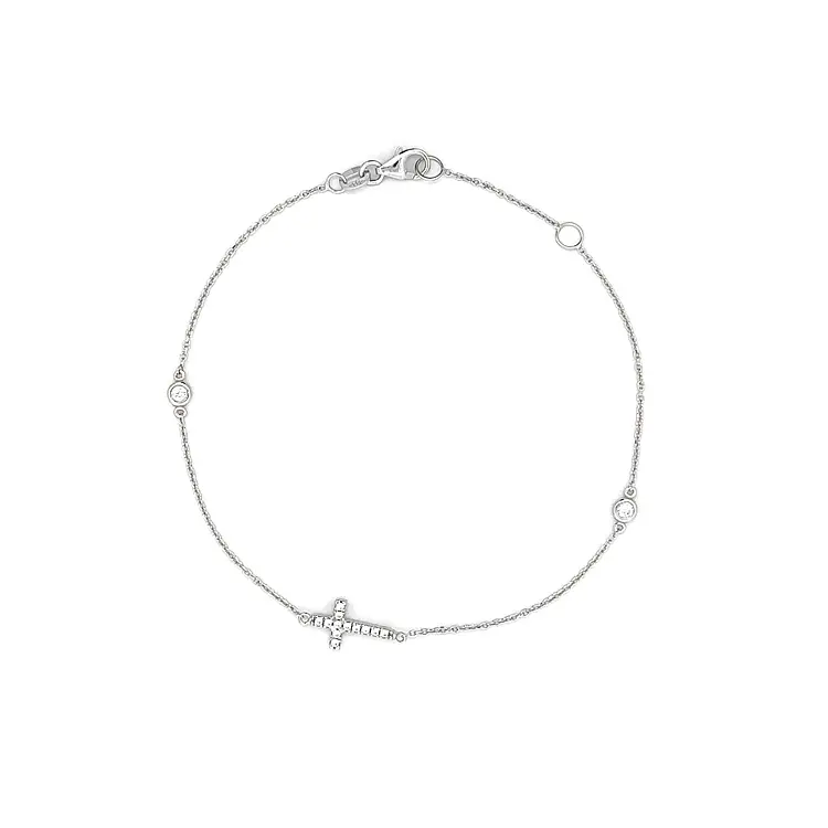 Браслет с цирконами и крестом из белого золота