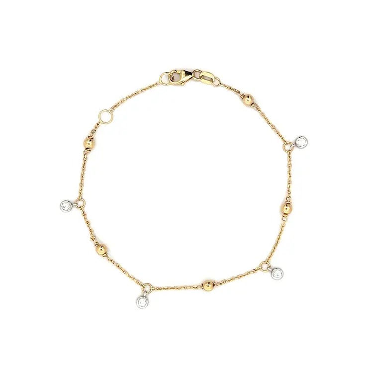 Браслет с цирконами из комбинированного золота