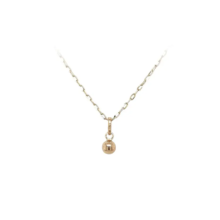 Золотой кулон с изображением пули