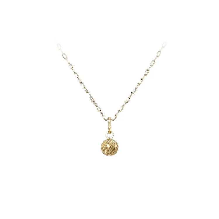 Золотой кулон с изображением пули