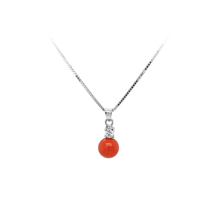 Кулон с кораллом из белого золота